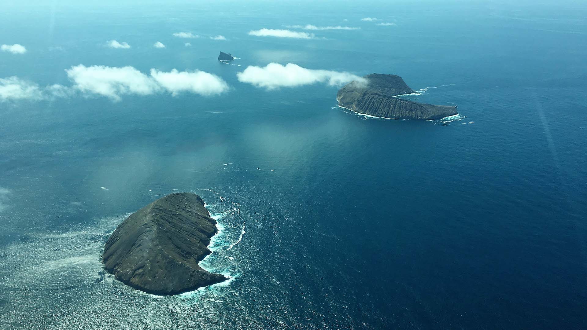 Stunning aerial view of volcanic islets in the Galápagos Islands, Ecuador.
